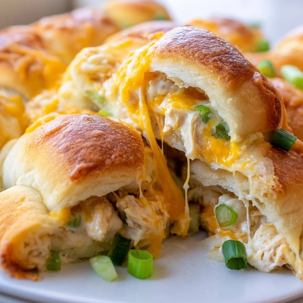 Creamy chicken and cheese stuffed crescent rolls baked to golden brown perfection